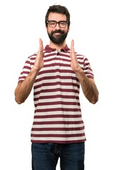 Fototapeta premium Man with glasses holding something
