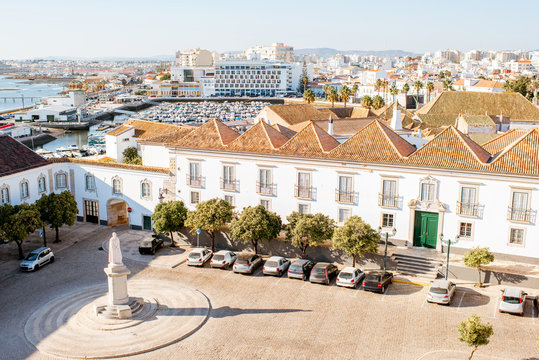 Top cityscape view on the old town with beautiful rooftops in Faro on the south of Portugal