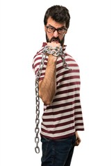 Man with glasses with chains