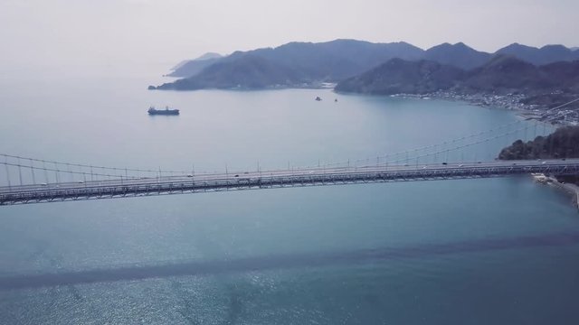 Suspension Bridge With Shipping Tanker In Japan 