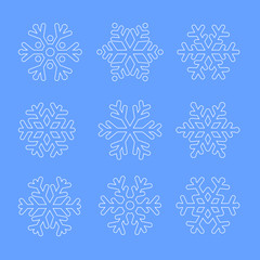 Vector outline silhouette snowflakes on blue sky background
