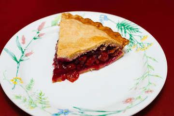 serving up the traditional holiday cherry pie