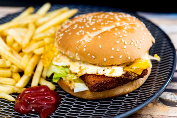 Fish burger with Golden French fries
