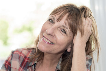 Fototapeta premium Portrait of smiling mature woman
