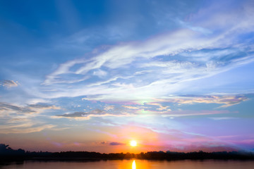 Sunrise sunset in the city with selective focus on the sun