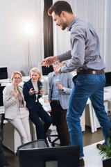 Obraz premium business colleagues with glasses of champagne