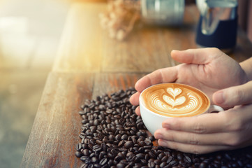 coffee latte art and coffee beans.