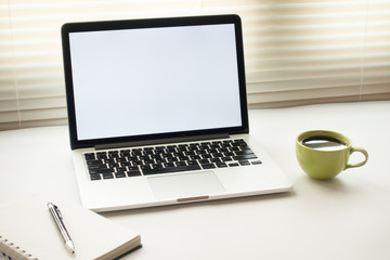 Fototapeta premium Business Technologies. Workplace with open laptop on modern wooden desk.