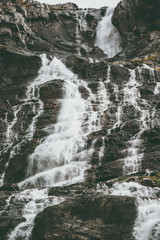 Waterfall Landscape at rocky mountains Travel serene scenic view Norway Jotunheimen national park