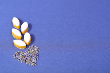 French Provence calisson sweets looking like an ear of wheat and lavender heart.