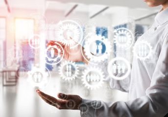 Cogwheels and gears mechanism as social communication concept