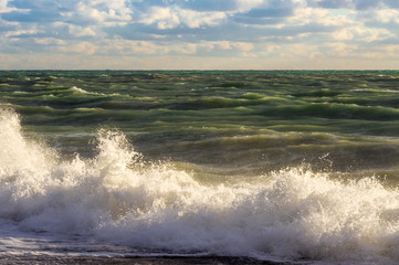 Wave of the sea falls beautifully on the shore and the sprays fly