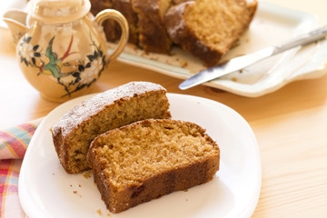 Fototapeta na wymiar sweet almond homemade cake on white plate with coffee