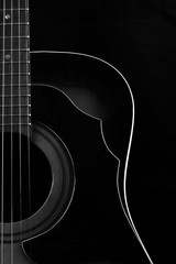 Part of acustic guitar in black and white
