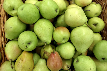Vegetables and fruits lie on the counter in the store.