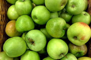 Vegetables and fruits lie on the counter in the store.