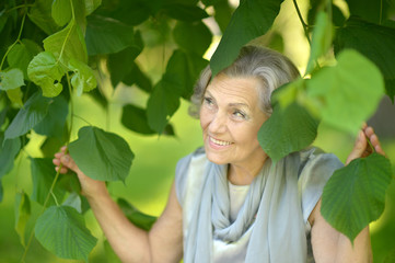 woman posing in summer park 