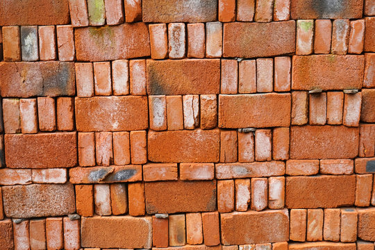 Stacking Red Bricks As Construction Material Background