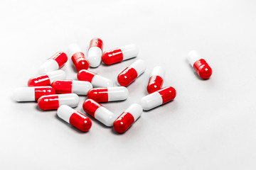 Red and White Capsules ( Pills )
