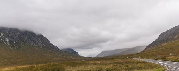  Scotland, UK  Mountains in mist with clouds 
