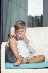 Small boy with mobile phone.