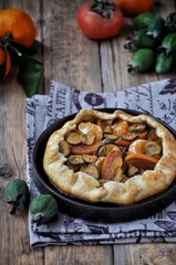 Galetta. Open fruit cake with a feijoa, persimmon, mandarins