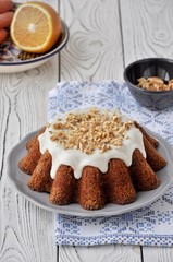 Carrot cake with walnuts, in sugar glaze