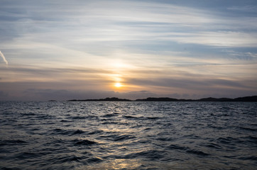 Obraz premium Sun is setting over the archipelago, Kristiansand Norway