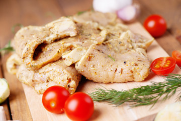 Raw marinated pork meat and vegetables 