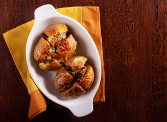 Mushroom jacket potatoes in a tin