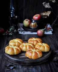 Naklejka na ściany i meble Buns in the form of a pumpkin, with apple stuffing