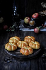 Obraz na płótnie Canvas Buns in the form of a pumpkin, with apple stuffing