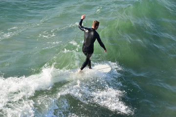 A surfer at Newport Beach, California.