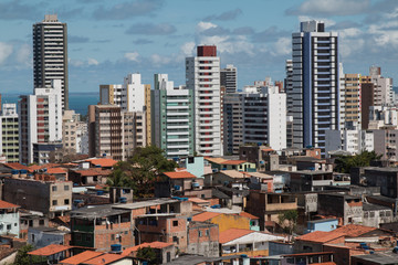 Fototapeta na wymiar Social inequality - Buildings and favela