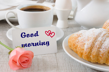 Morning coffee cup croissant