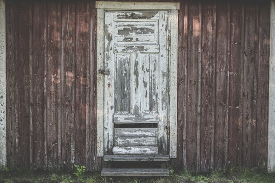 Old wooden door with weathered paint
