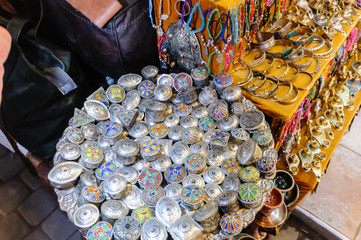 Handmade metal pill boxes for sale in the Souks, Marrakech, Morocco