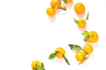 Orange mandarins on a white table/ Flat lay food photo, top view. Mock-up, copy space. Mandarin - Symbol of the Eastern (Chinese) New Year