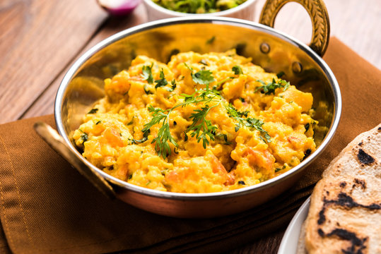 Pithla Bhakar or spicy besan curry or zunka is a popular food recipe made up of Gram flour and jowar flour from Maharashtra India
