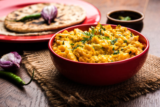 Pithla Bhakar or spicy besan curry or zunka is a popular food recipe made up of Gram flour and jowar flour from Maharashtra India
