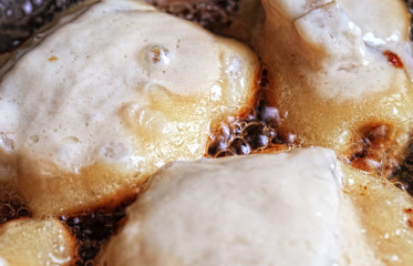 fish in the dough in the pan