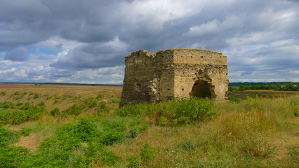 Tower of the former castle in Zhvanets on the river Zhvanets and Dniester. Single tower - the ruins of the former border fortress of Poland currently Ukraine