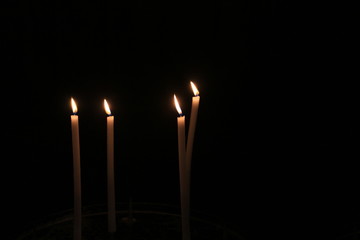four burning candles