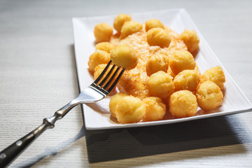 Fried mashed potato balls and nuggets