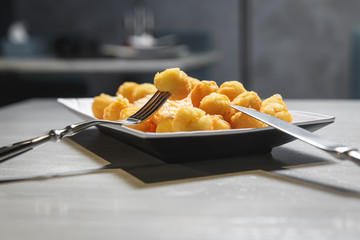 Fried mashed potato balls and nuggets