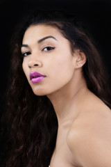Fototapeta premium Bare Shoulders Portrait Attractive Latina Woman Dark Background