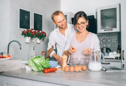 Simply family moments - couple prepare breakfast