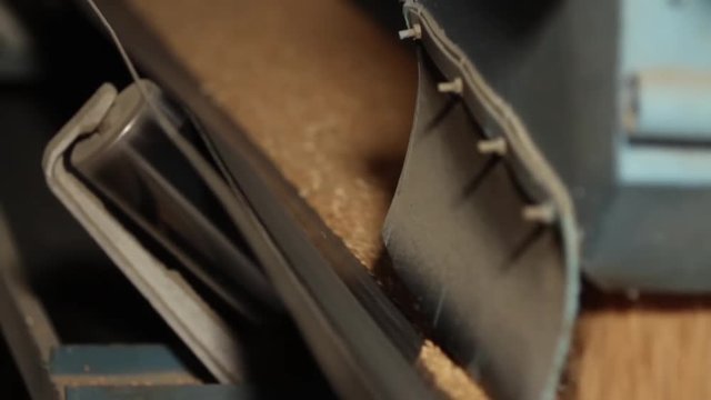 Grain moves along the conveyor belt. Wheat is transported by conveyor for drying and grinding in a mill. Wheat is ground into flour. Wheat grain on the conveyor.