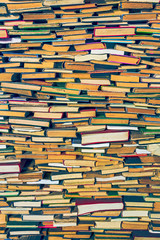Background of many old books stacked on each other and used for design