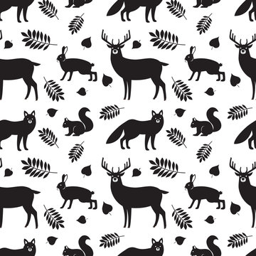 Seamless pattern of black forest animals and plants: fox, deer, hare, squirrel and autumn leaves on white background. Vector background. Illustration of wild animals